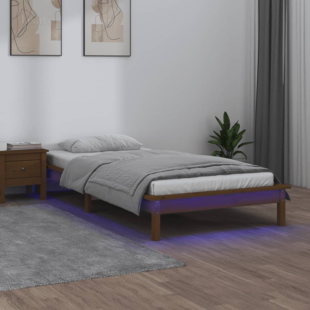 Solid wood bed with LED lighting honey brown 90x200 cm