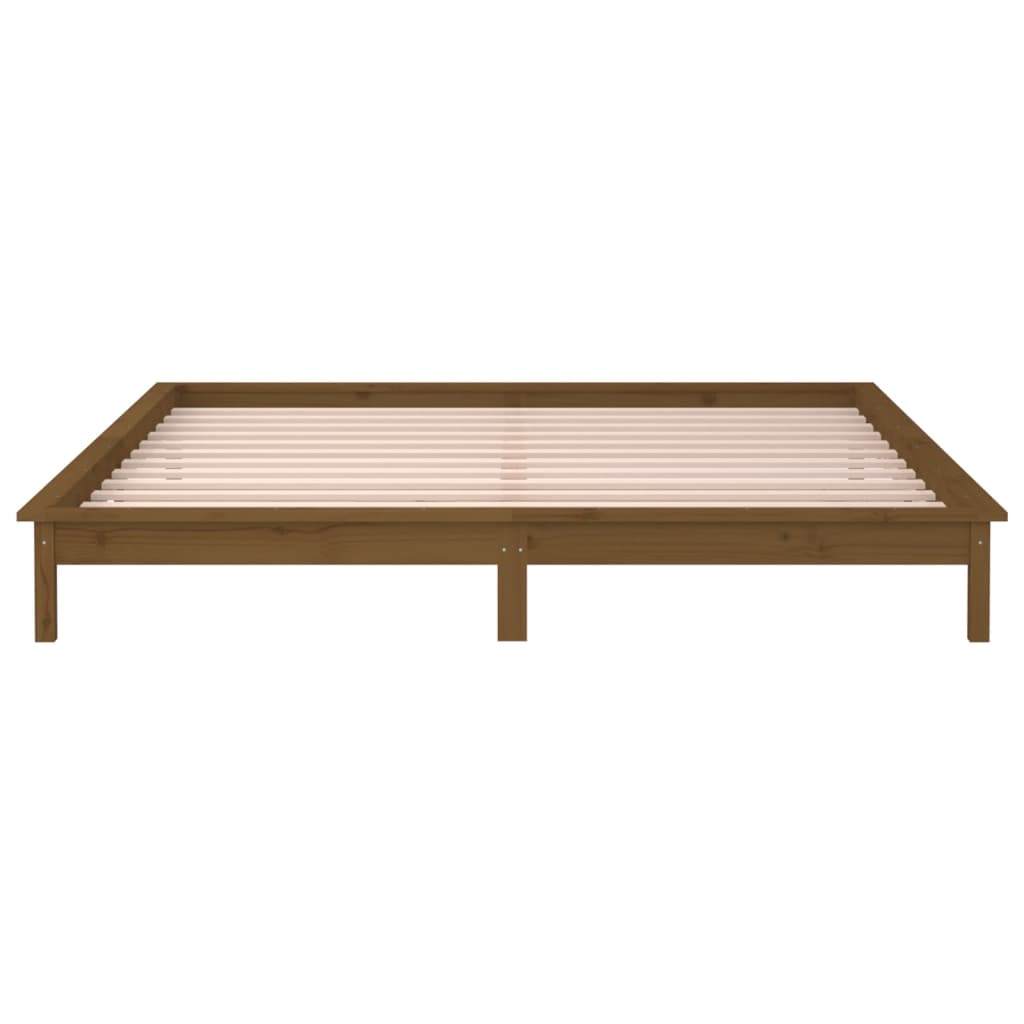 Solid wood bed with LEDs honey brown 140x200 cm