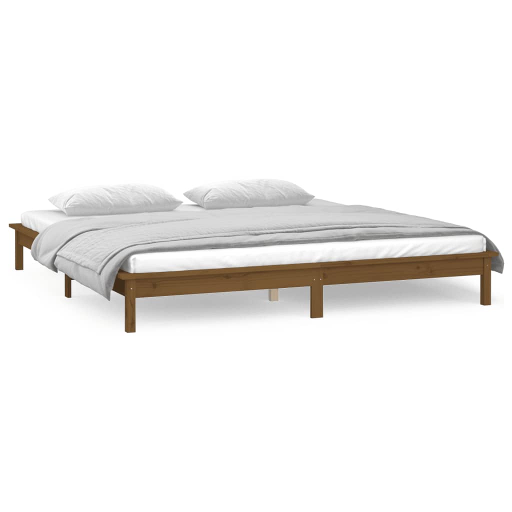 Solid wood bed with LEDs honey brown 135x190 cm