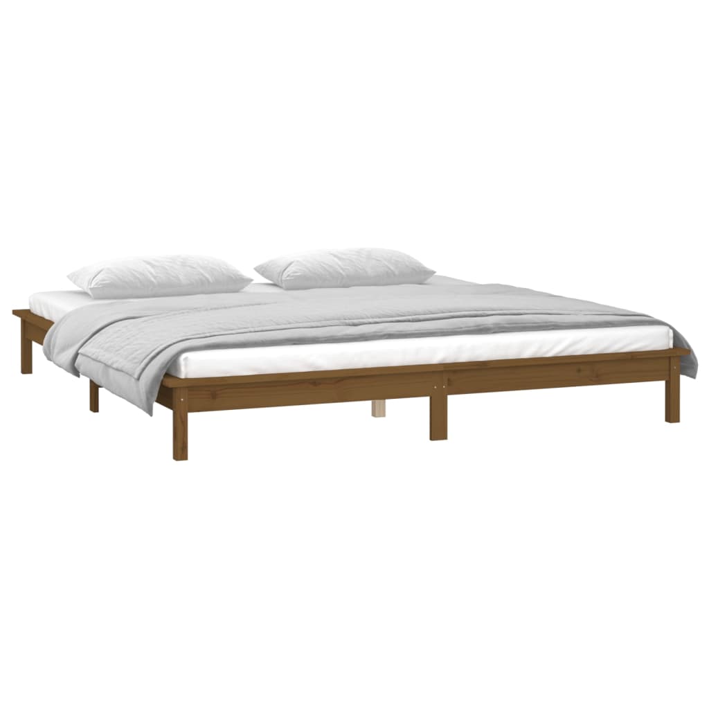 Solid wood bed with LEDs honey brown 135x190 cm