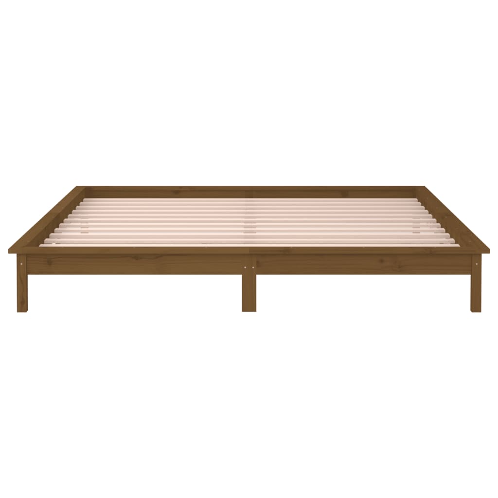 Solid wood bed with LEDs honey brown 135x190 cm