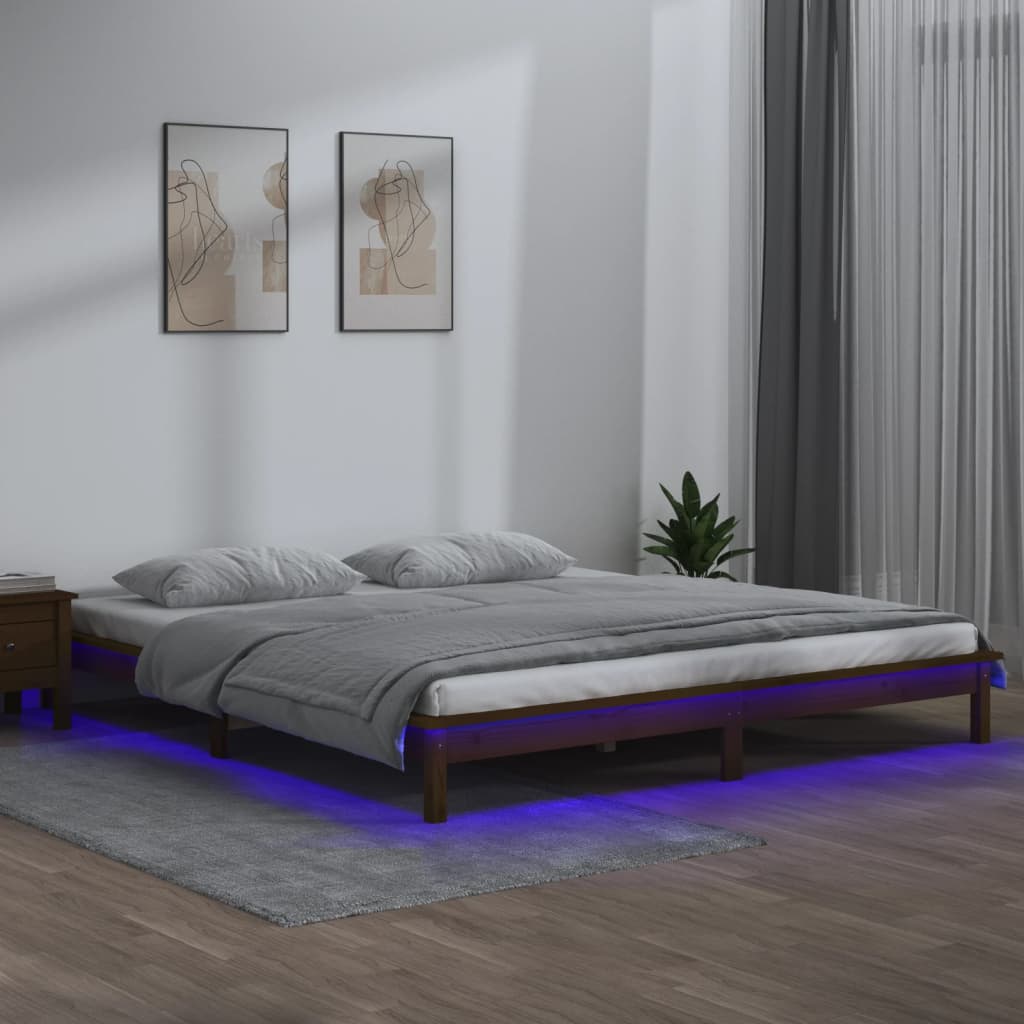 Solid wood bed with LEDs honey brown 135x190 cm