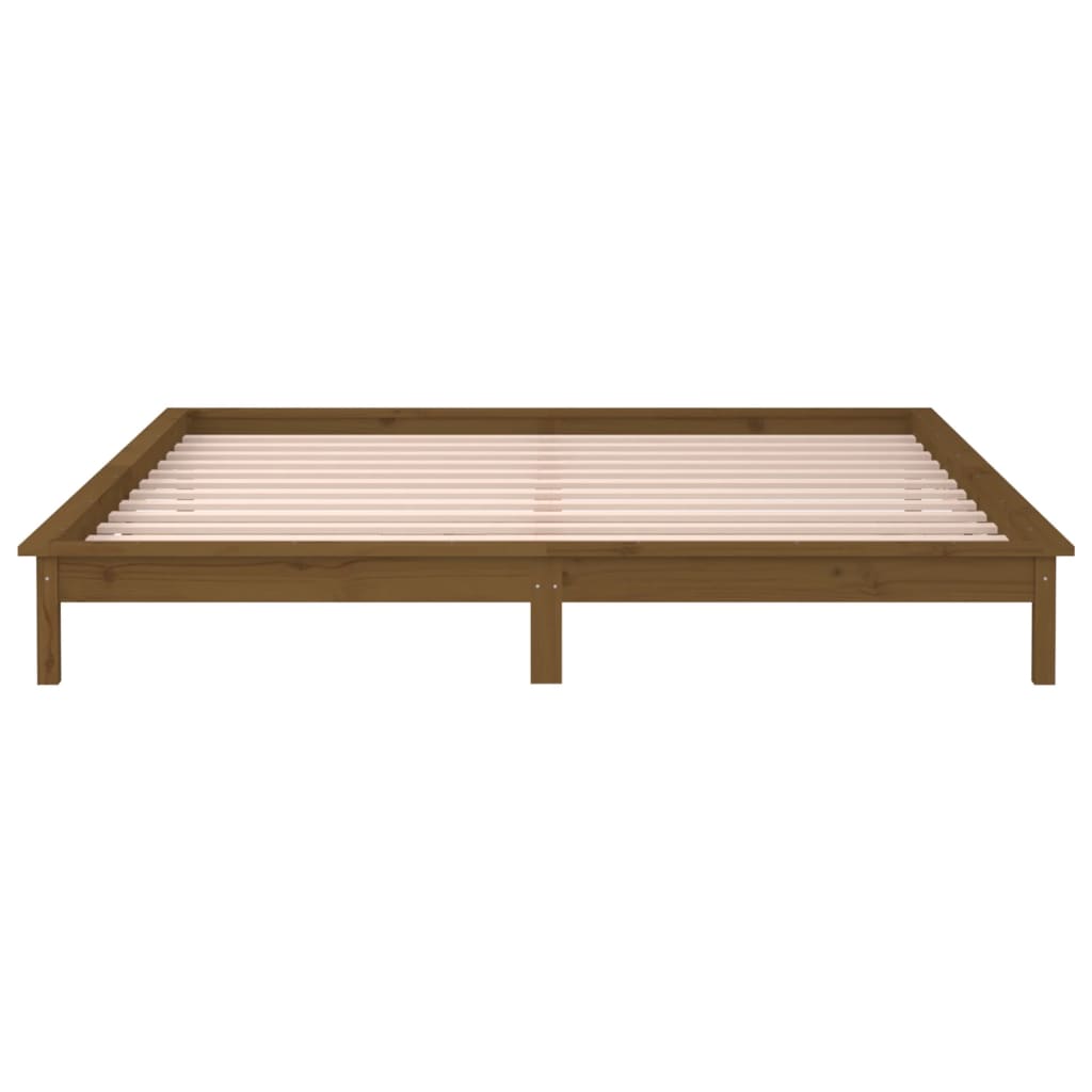 Solid wood bed with LEDs honey brown 140x190 cm